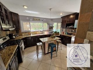 Zona 16 Kanajuyu preciosa casa en venta — Casa en Venta en Kanajuyú, Zona 16, Guatemala, Ciudad — miniatura 1 de 11