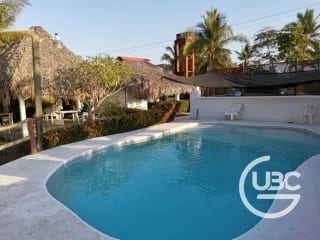 Terreno con 2 boungalows en Monterrico — Terreno en Venta en Monterrico, Santa Rosa — miniatura 1 de 7