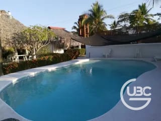 Terreno con 2 boungalows en Monterrico — Terreno en Venta en Monterrico, Santa Rosa — miniatura 5 de 7
