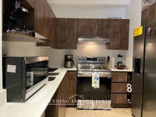 Apartamento amueblado en renta zona 10 edificio Habitat Ciudad Vieja de 3 habitaciones + 2 parqueos — Apartamento en Alquiler en Habitat Ciudad Vieja, Zona 10, Guatemala, Ciudad — miniatura 6 de 10